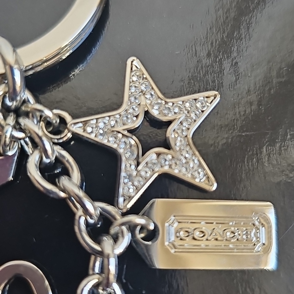 Coach NWOT Silver Keychain with Heart, Star, and Butterfly Charms - Picture 3 of 7